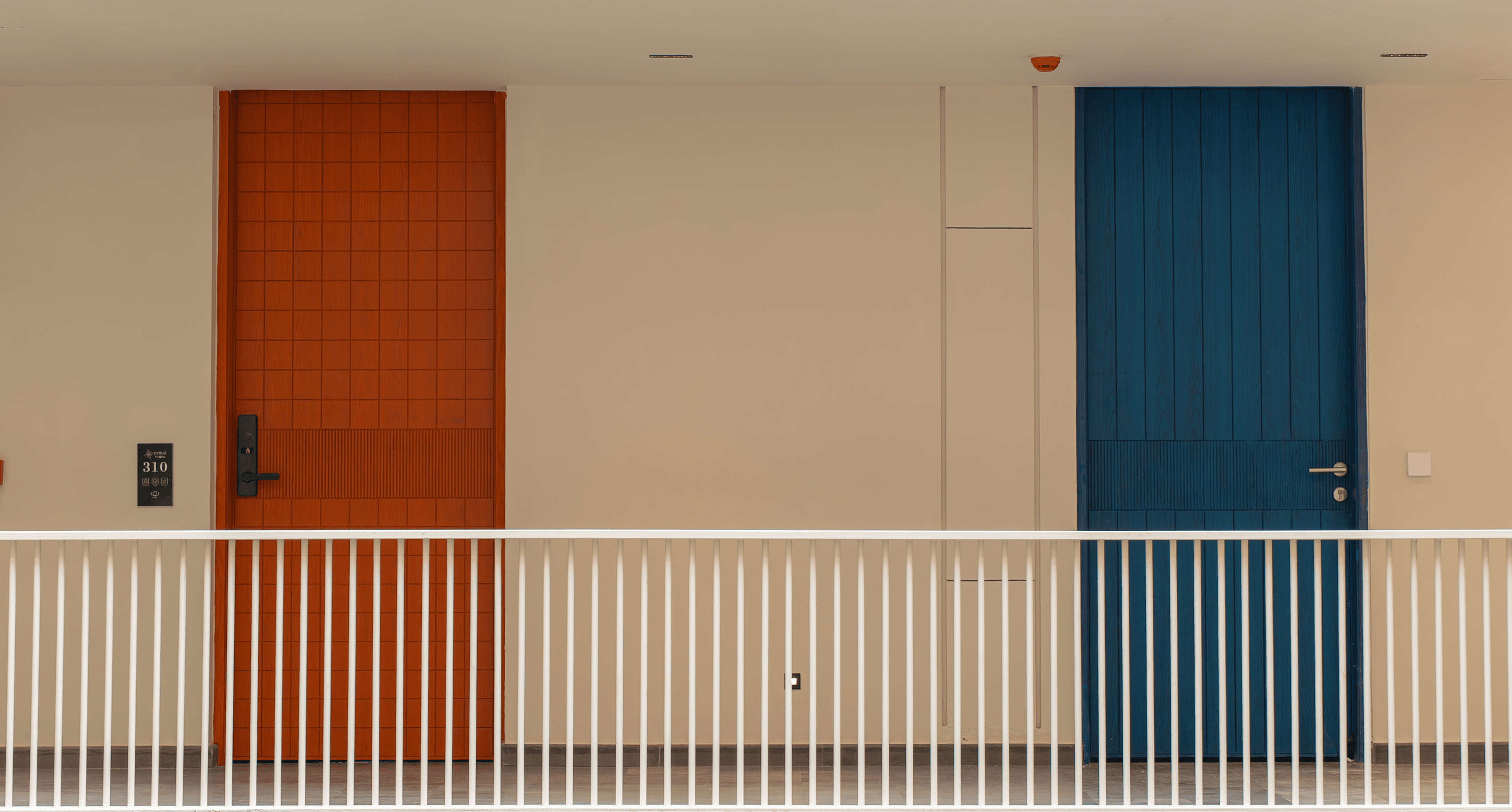 Cyrus One Hotel corridor with colourful doors