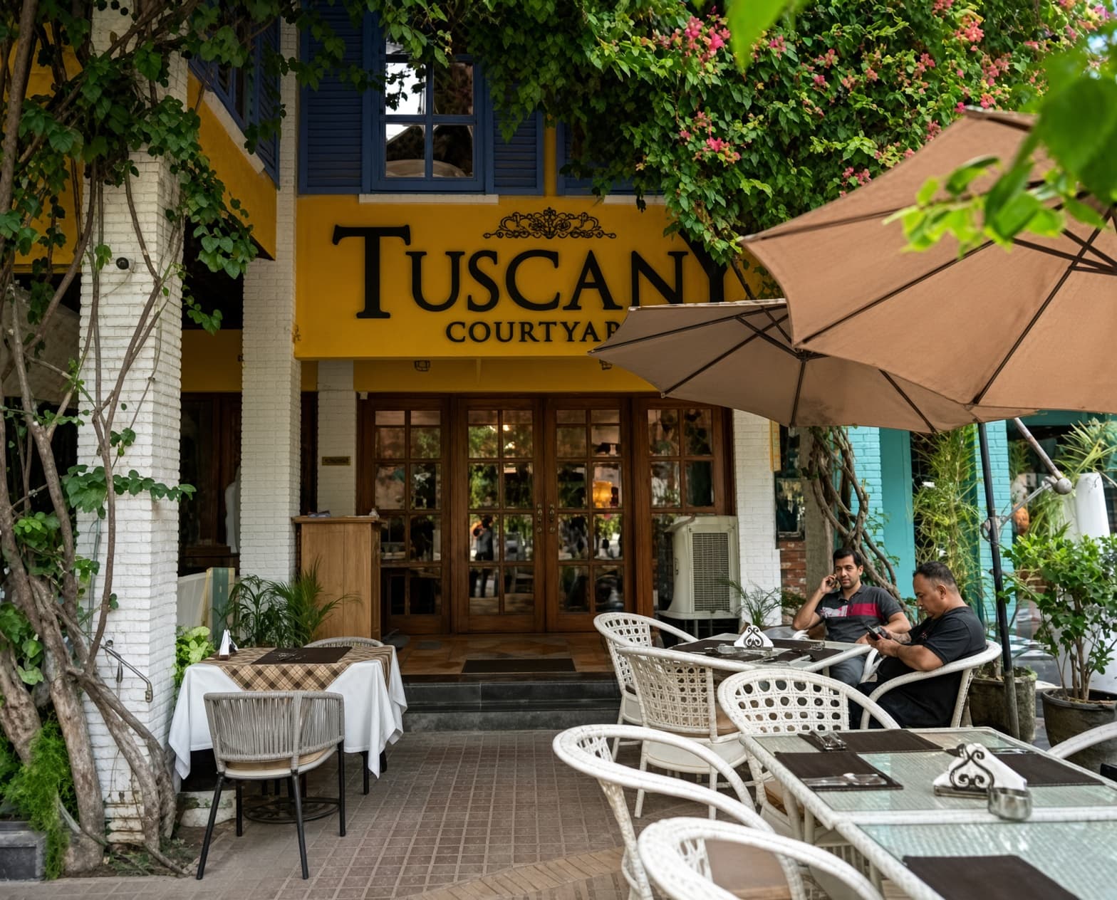 Tuscany Courtyard restaurant in Islamabad, featured as a dining recommendation for Cyrus One guests.